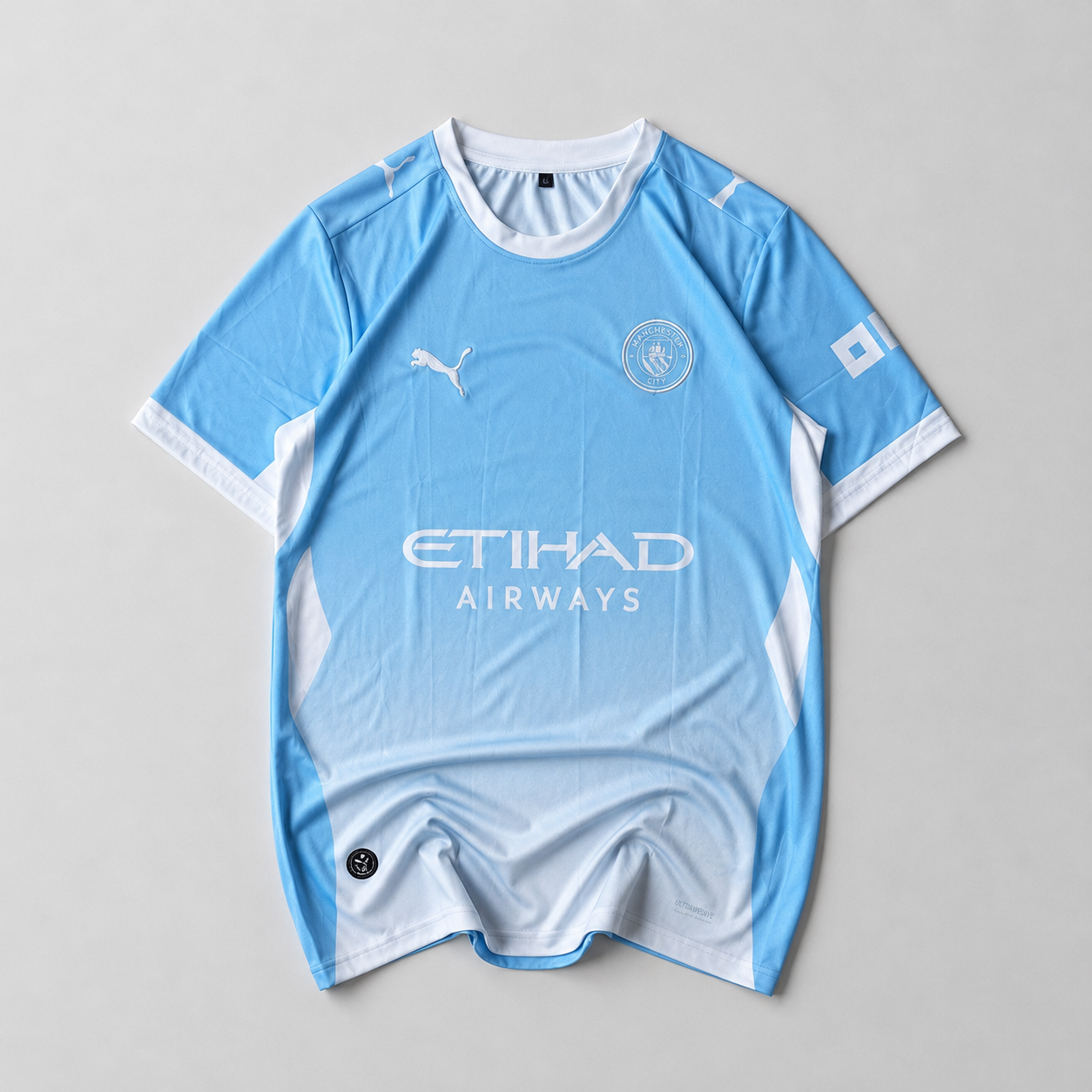Manchester City 2026-27 Haaland jersey front, sky blue kit with embroidered crest